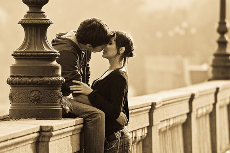 Couple Kissing on Bridge — Sepia