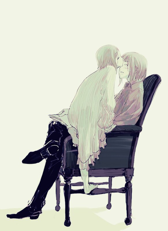 couple kissing on chair
