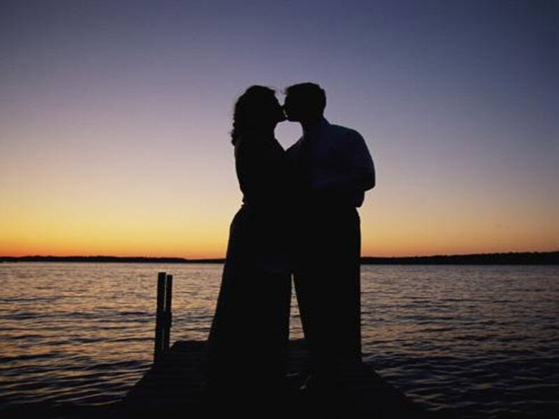 Couple Kissing on Dock — Purple, Romantic