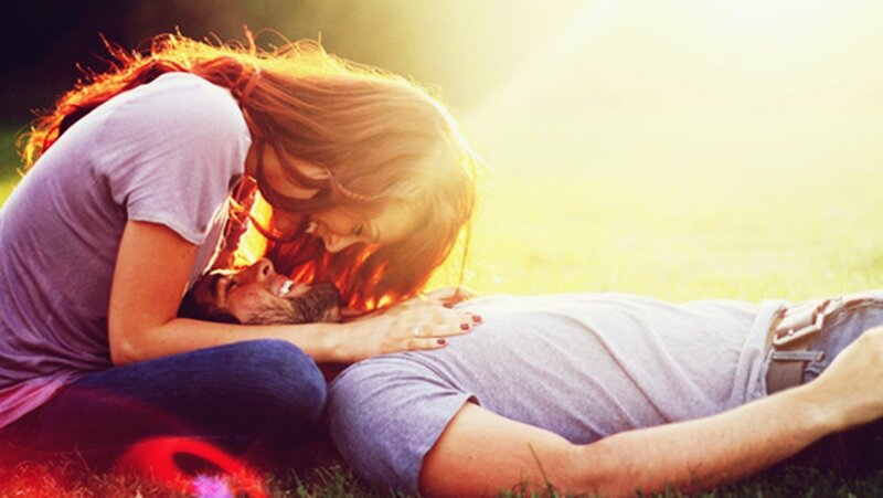Couple Kissing on Grass — Green, Romantic, Sunset, Photograph