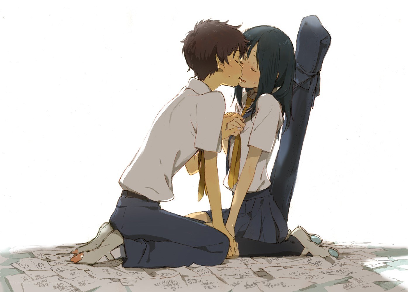 couple kissing on ground