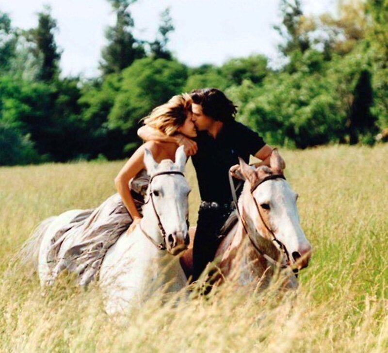 Couple Kissing on Horses — Green