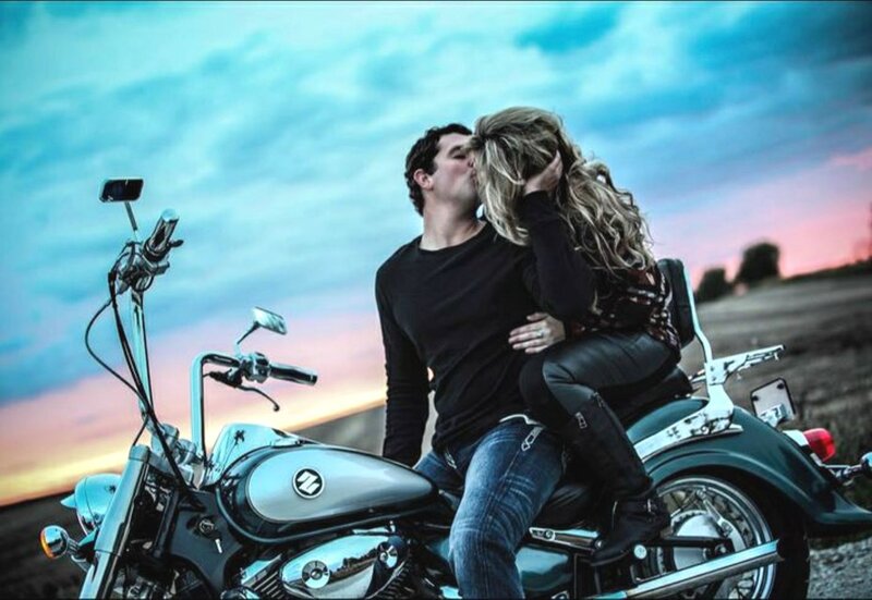 Couple Kissing on Motorcycle