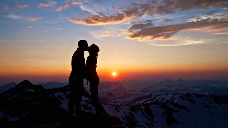 Couple Kissing on Mountain — Orange, Romantic, Sunset