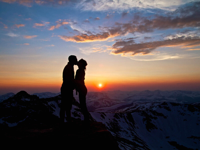 Couple Kissing on Mountain — Orange, Romantic