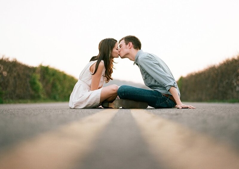 Couple Kissing on Road — Gray