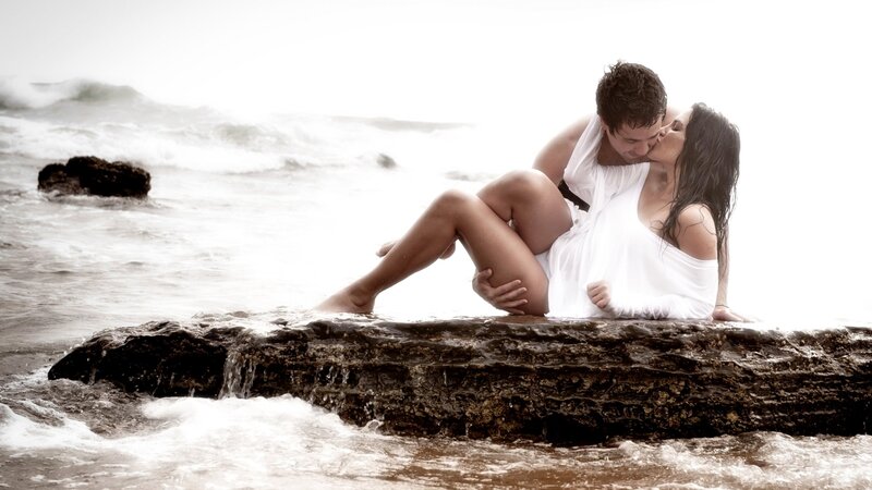Couple Kissing on Rock — White