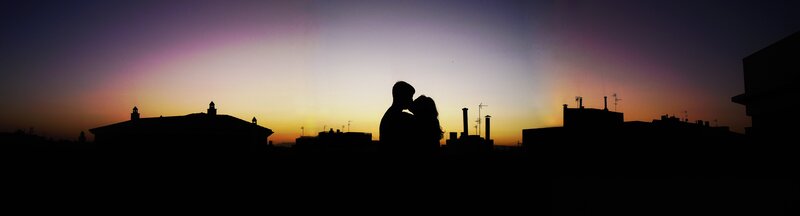 Couple Kissing on Rooftop — Purple