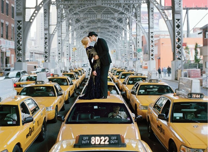 Couple Kissing on Taxis