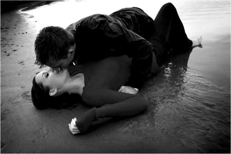 Couple kissing on the beach