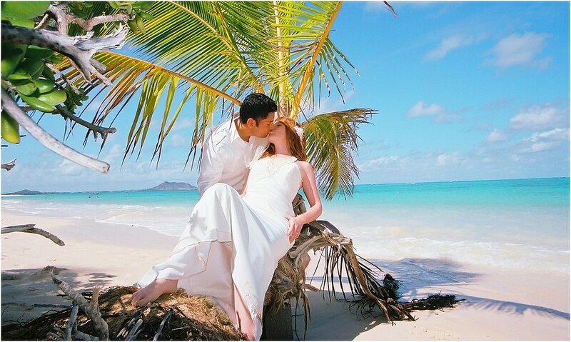 Couple kissing on tropical beach
