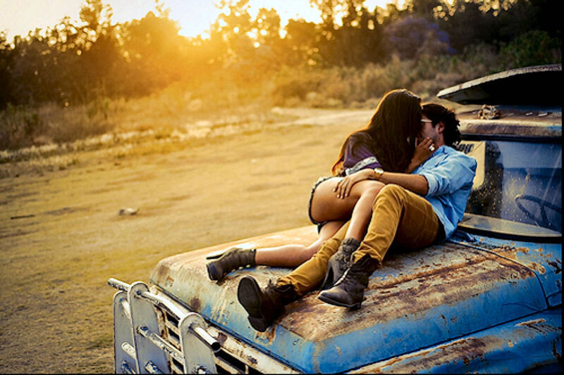 Couple Kissing on Truck