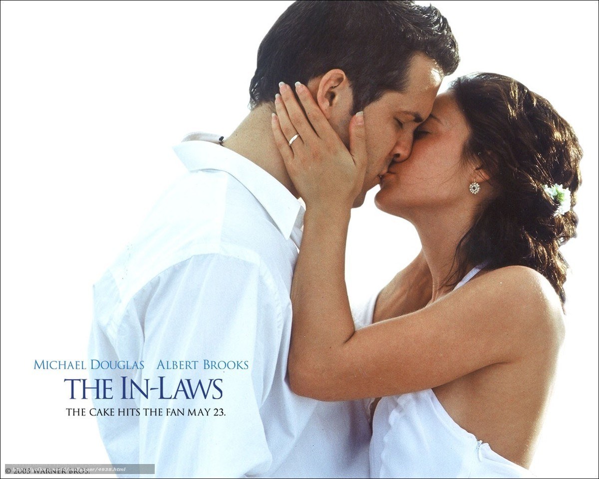 couple kissing on wedding day