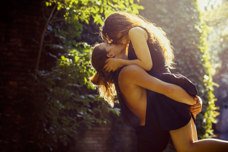 Couple Kissing Outdoors — Green, Romantic, Afternoon, Photograph