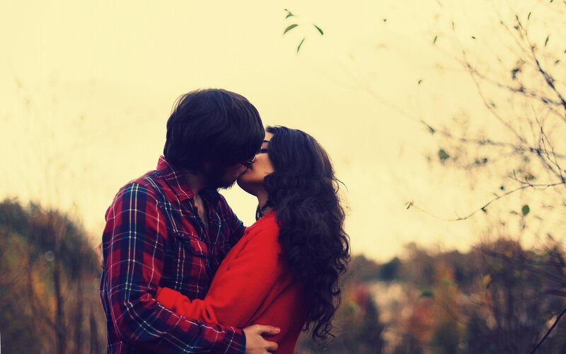 Couple Kissing Outdoors — Red, Romantic