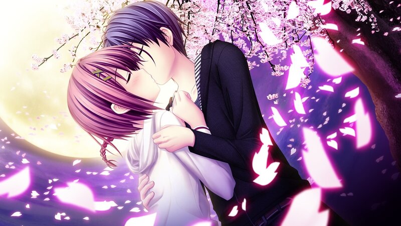 couple kissing under cherry blossoms