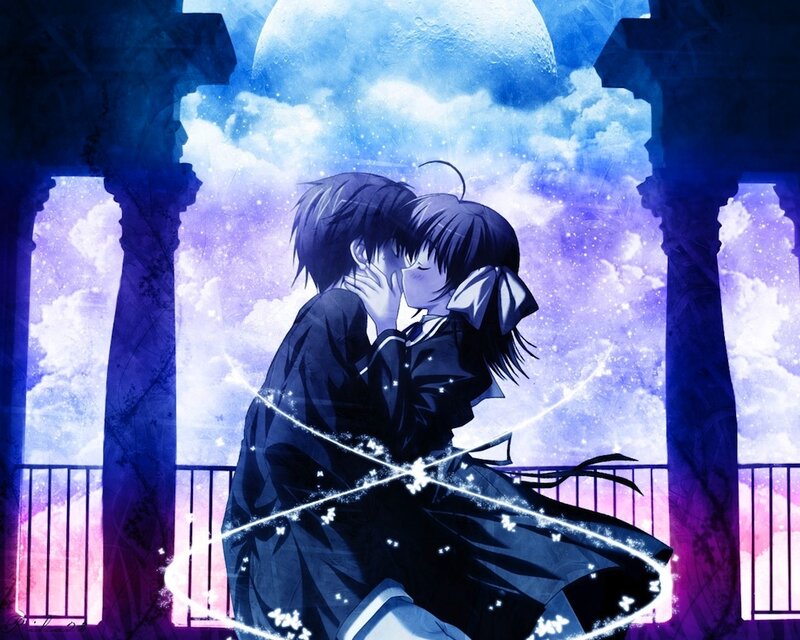 couple kissing under moonlight