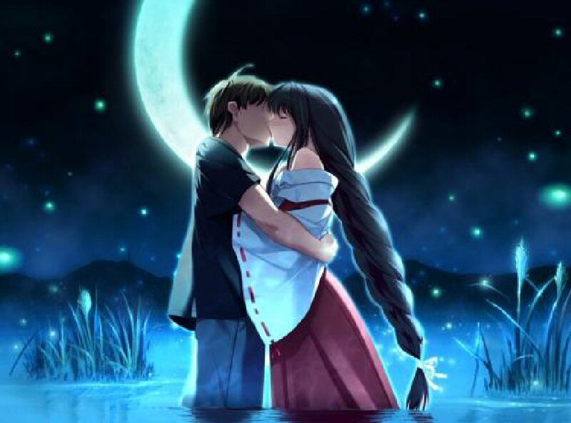 couple kissing under moonlight