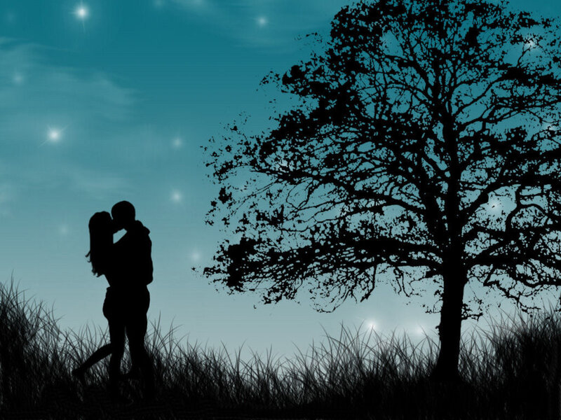 couple kissing under stars