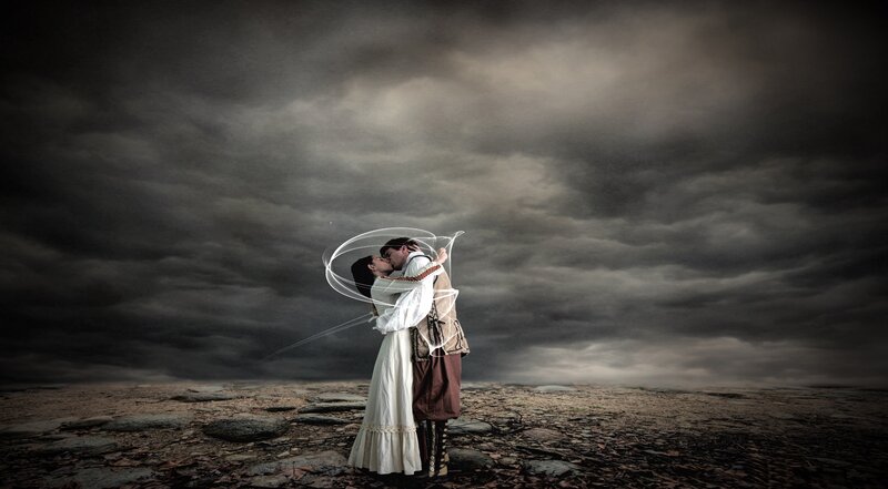 Couple Kissing under Stormy Sky