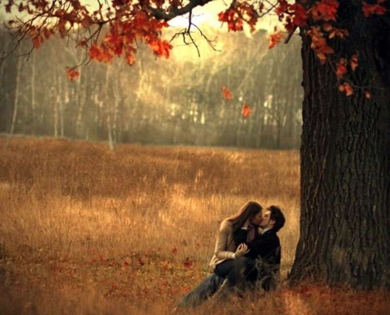 Couple Kissing under Tree