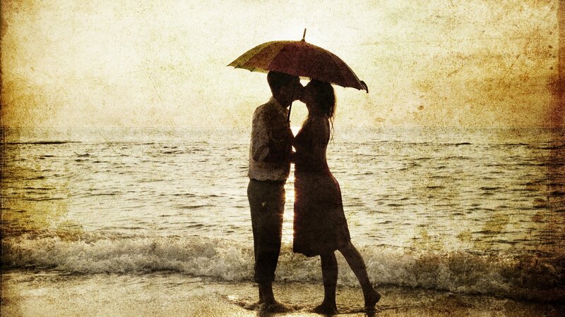 Couple Kissing under Umbrella — Brown, Romantic, Sunset, Photograph