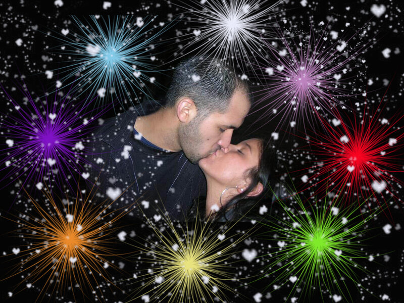 Couple Kissing with Fireworks
