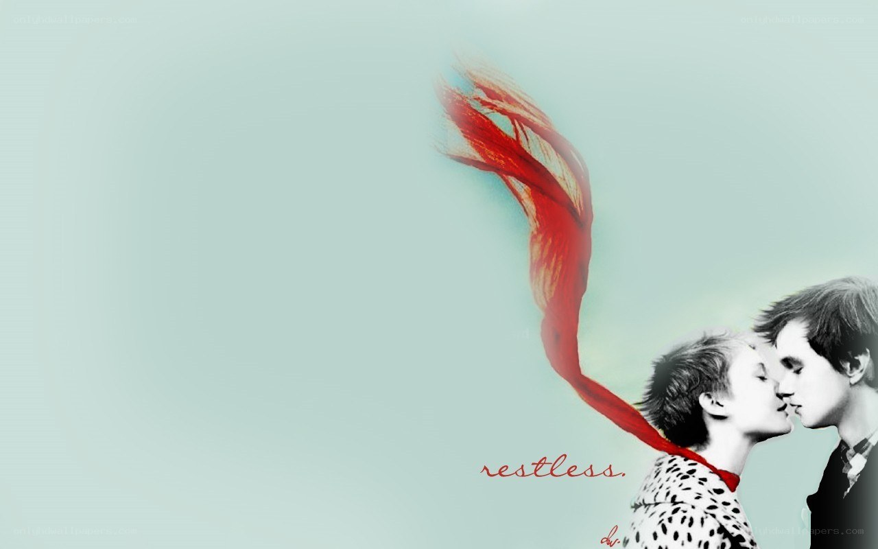 couple kissing with red scarf