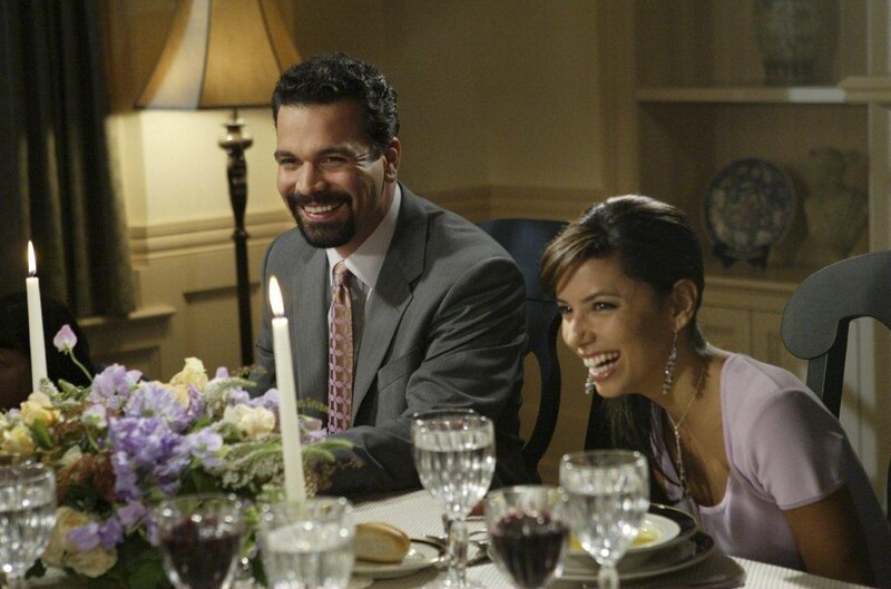 Couple laughing at dinner