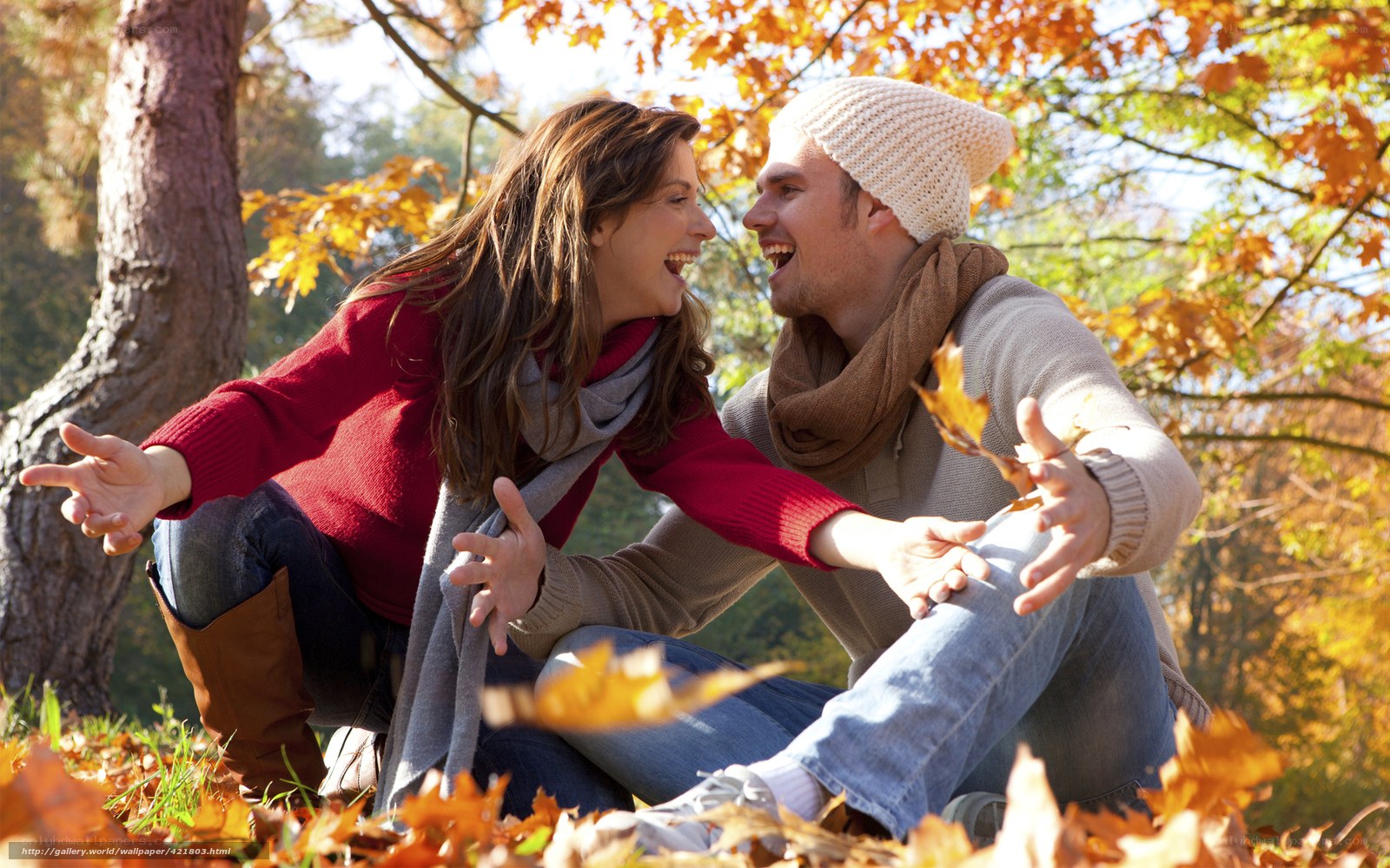 Couple laughing in autumn park