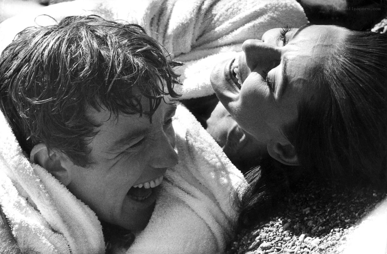 Couple laughing on beach