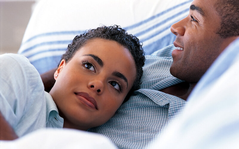 Couple Lying in Bed