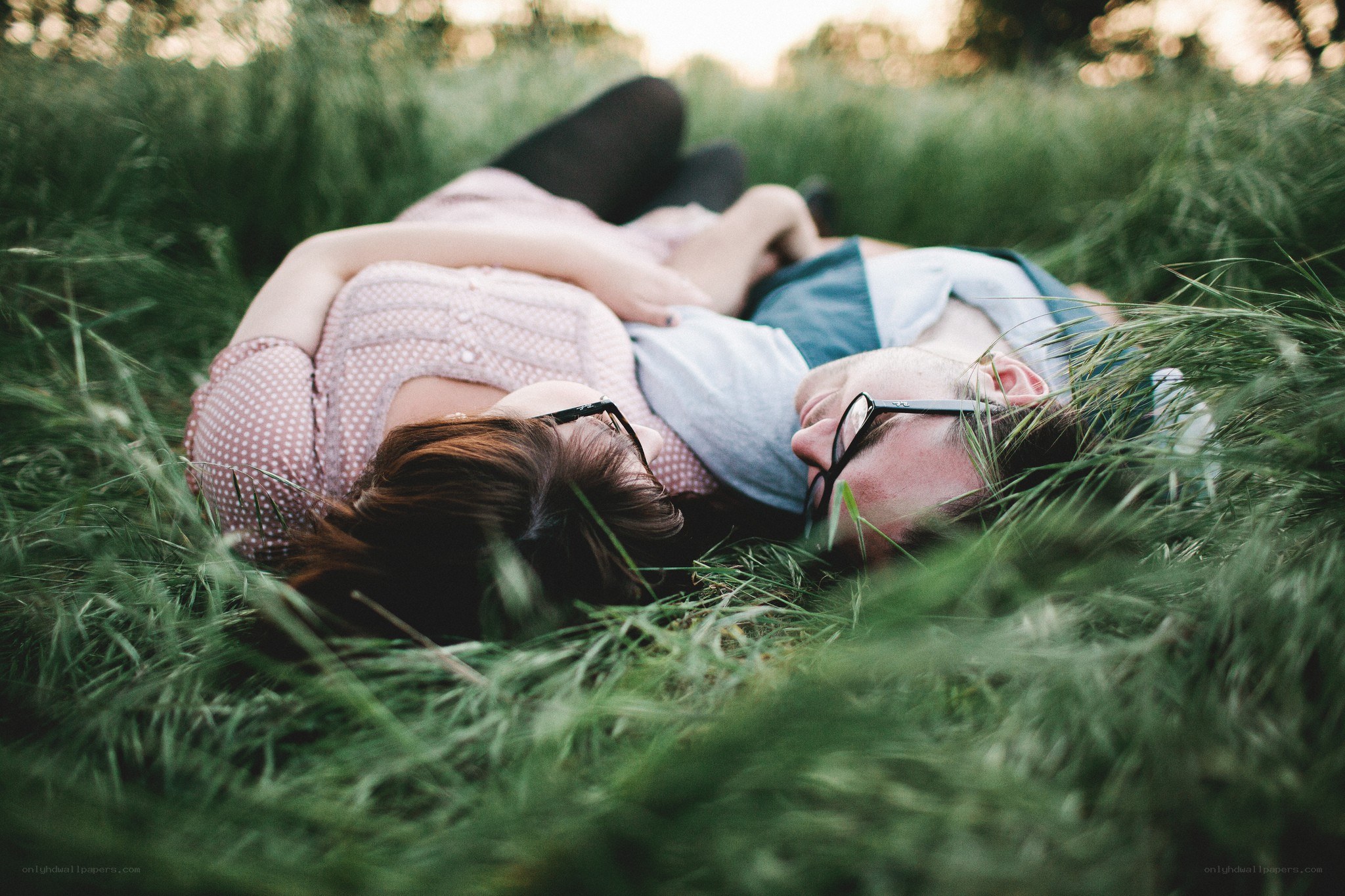 couple lying in grass