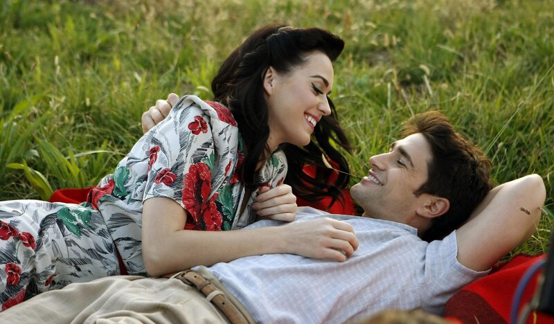 Couple lying in grass