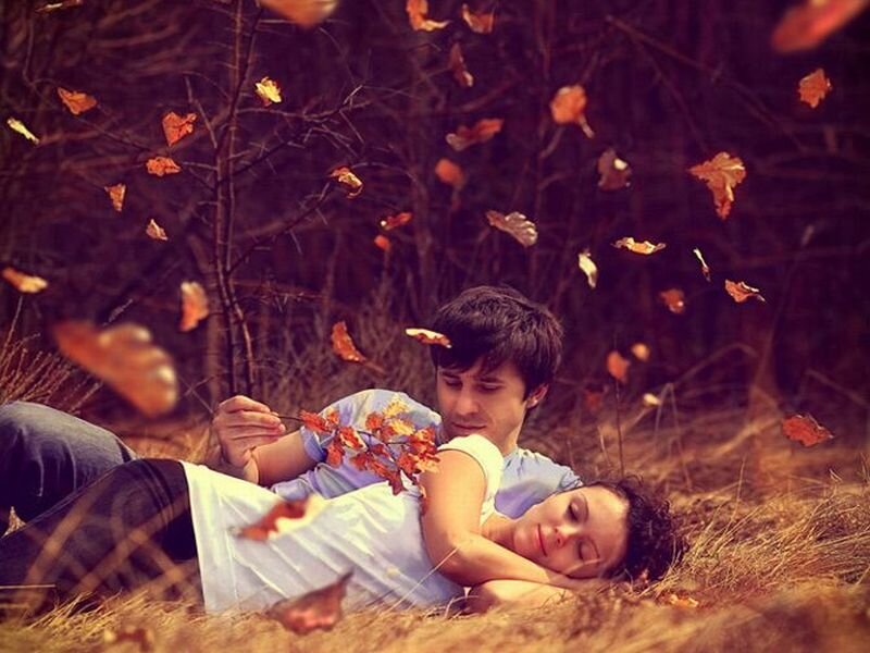 Couple Lying in Leaves