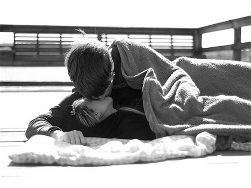 Couple Lying on Deck