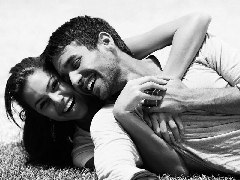 Couple Lying on Grass — Black, Happy