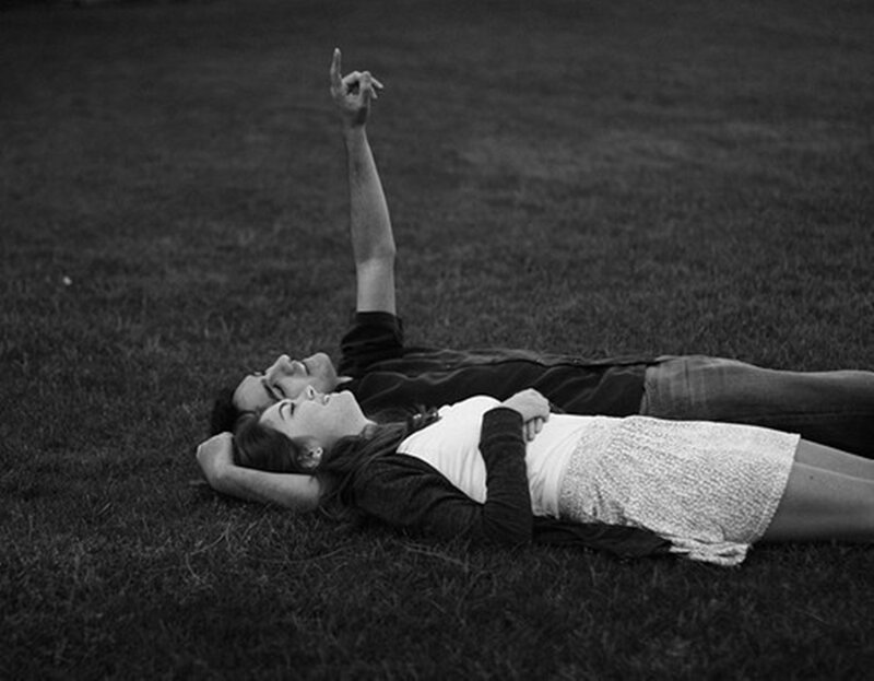Couple Lying on Grass — Black