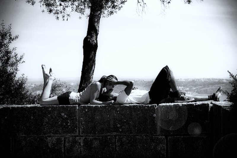 Couple Lying on Wall
