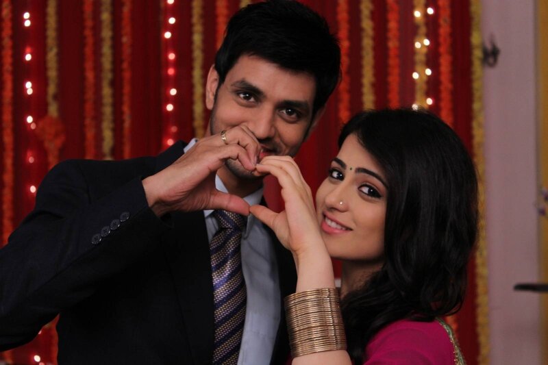 Couple Making Heart Gesture