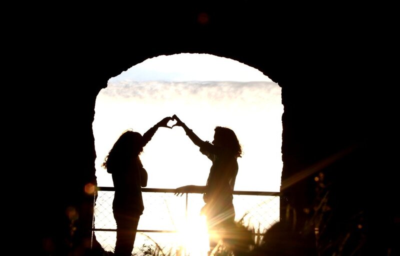 Couple making heart shape