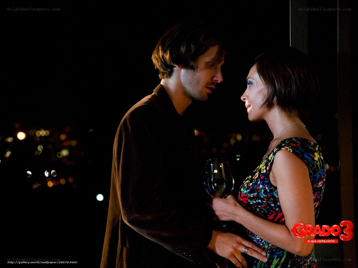 couple on a balcony at night