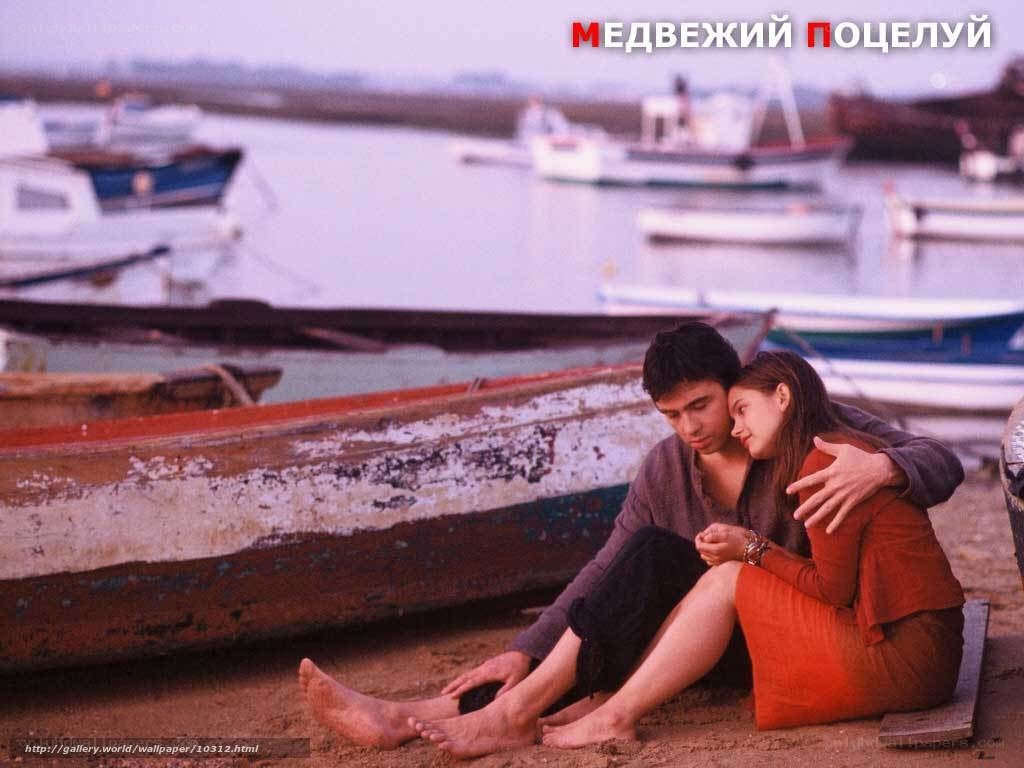 Couple on a beach at sunset