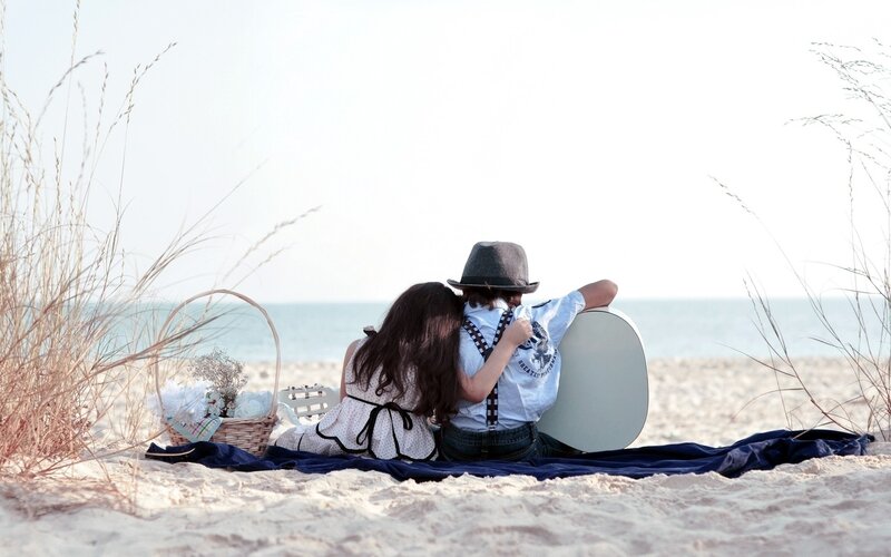 Couple on a beach picnic