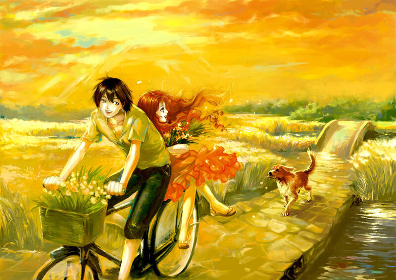Couple on a bike at sunset