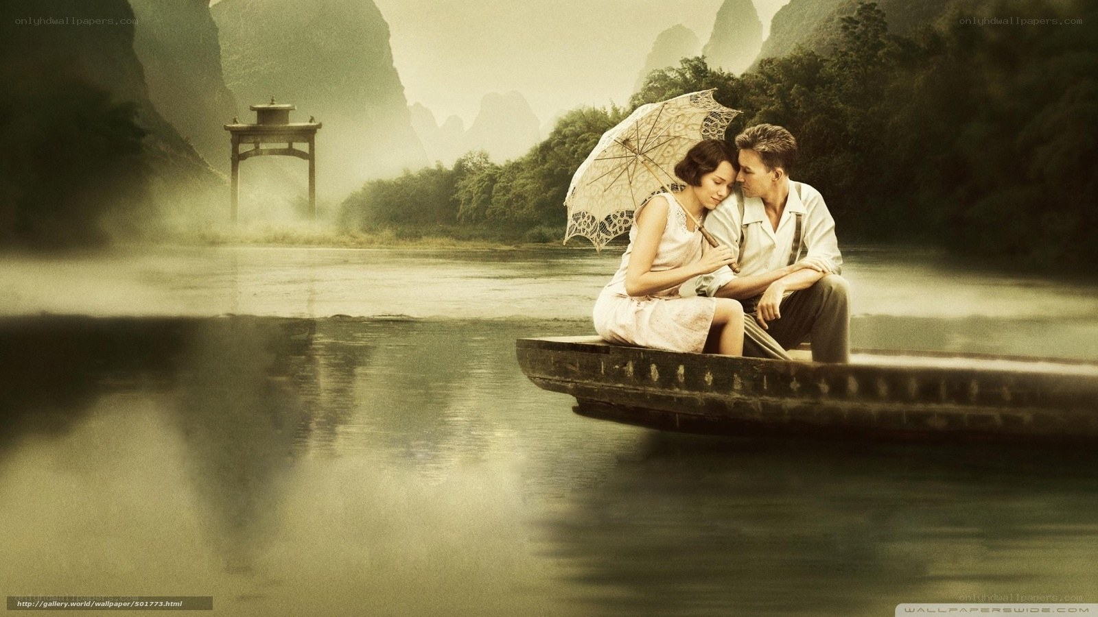 Couple on a boat in mist