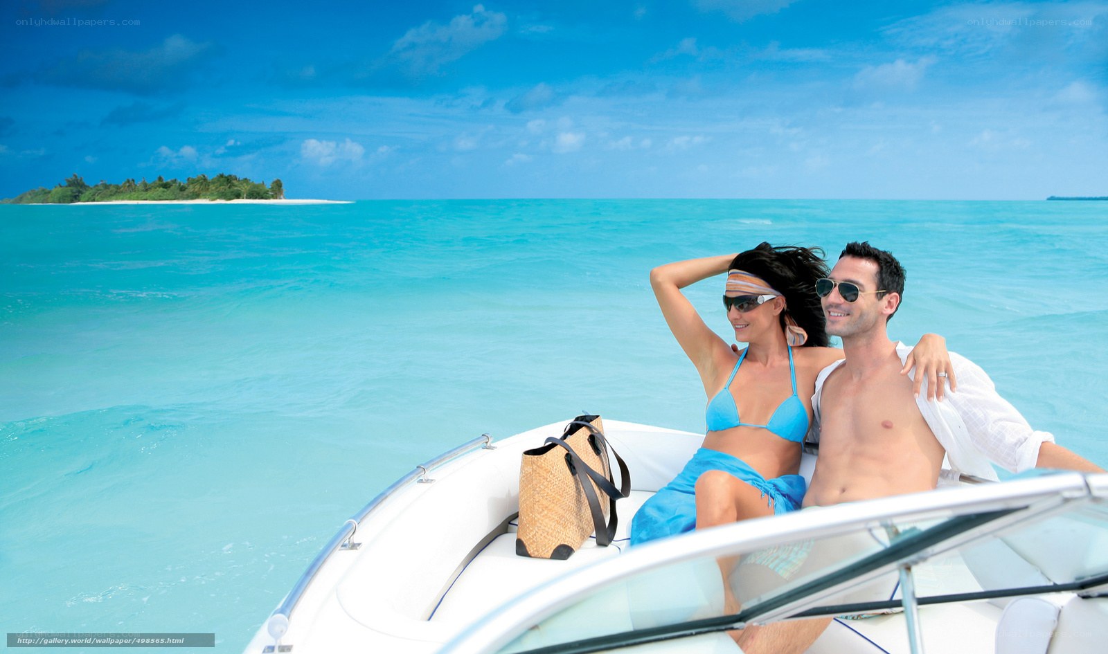 Couple on a boat in tropical waters