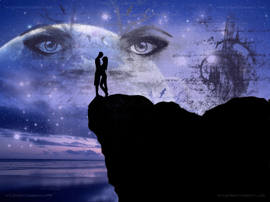Couple on a cliff at night