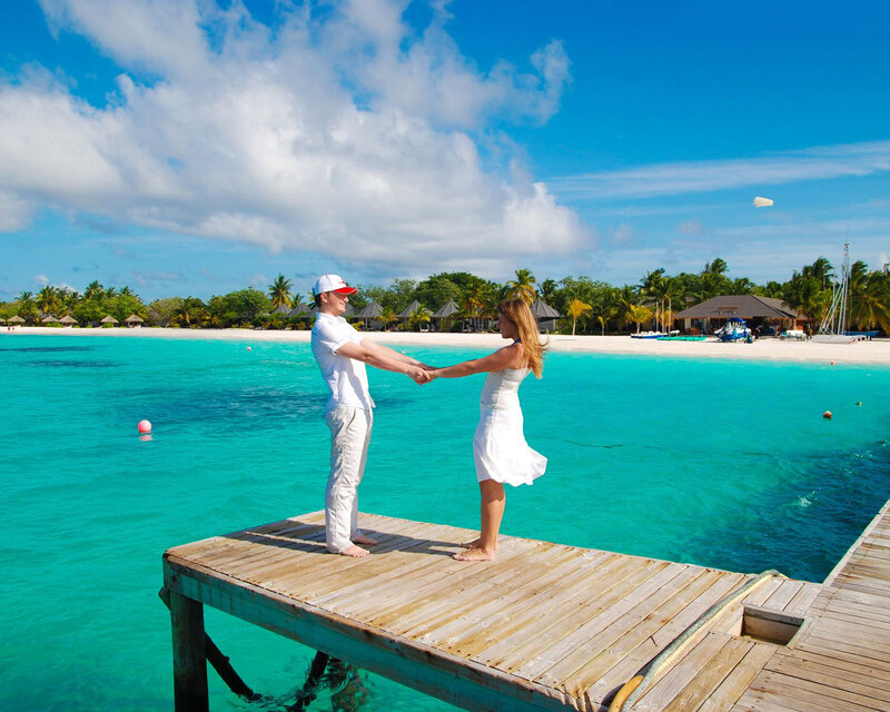 Couple on a Dock — Blue, Serene, Afternoon, Photograph