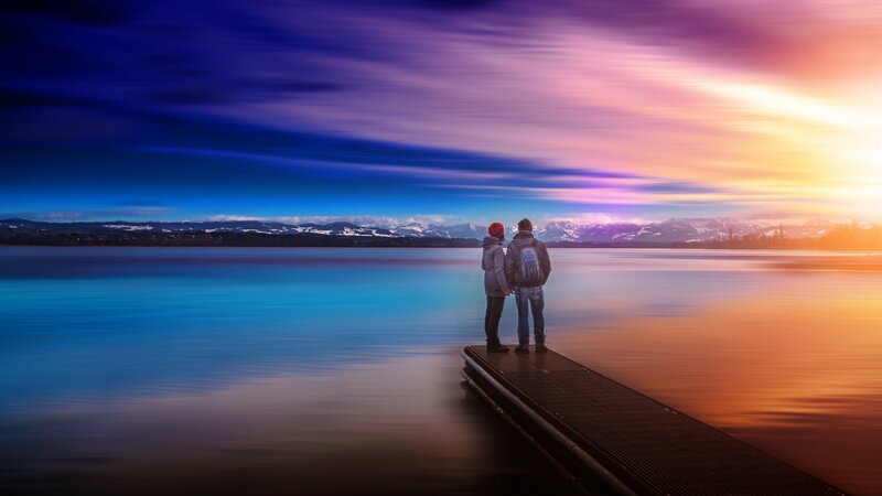 Couple on a Dock — Blue, Serene, Sunset, Photograph, Mountains
